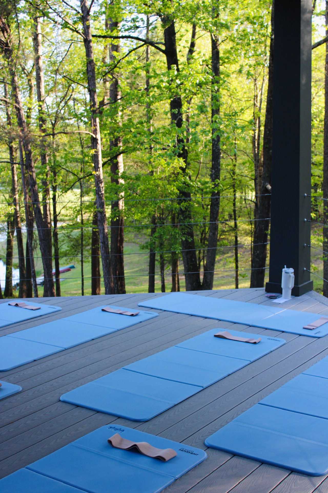 Mats set out on the retreat deck at sunrise